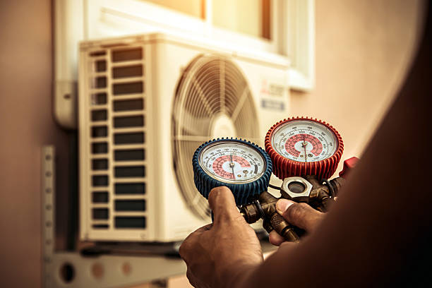 Professional Ac Installation technician working in Wenham, MA